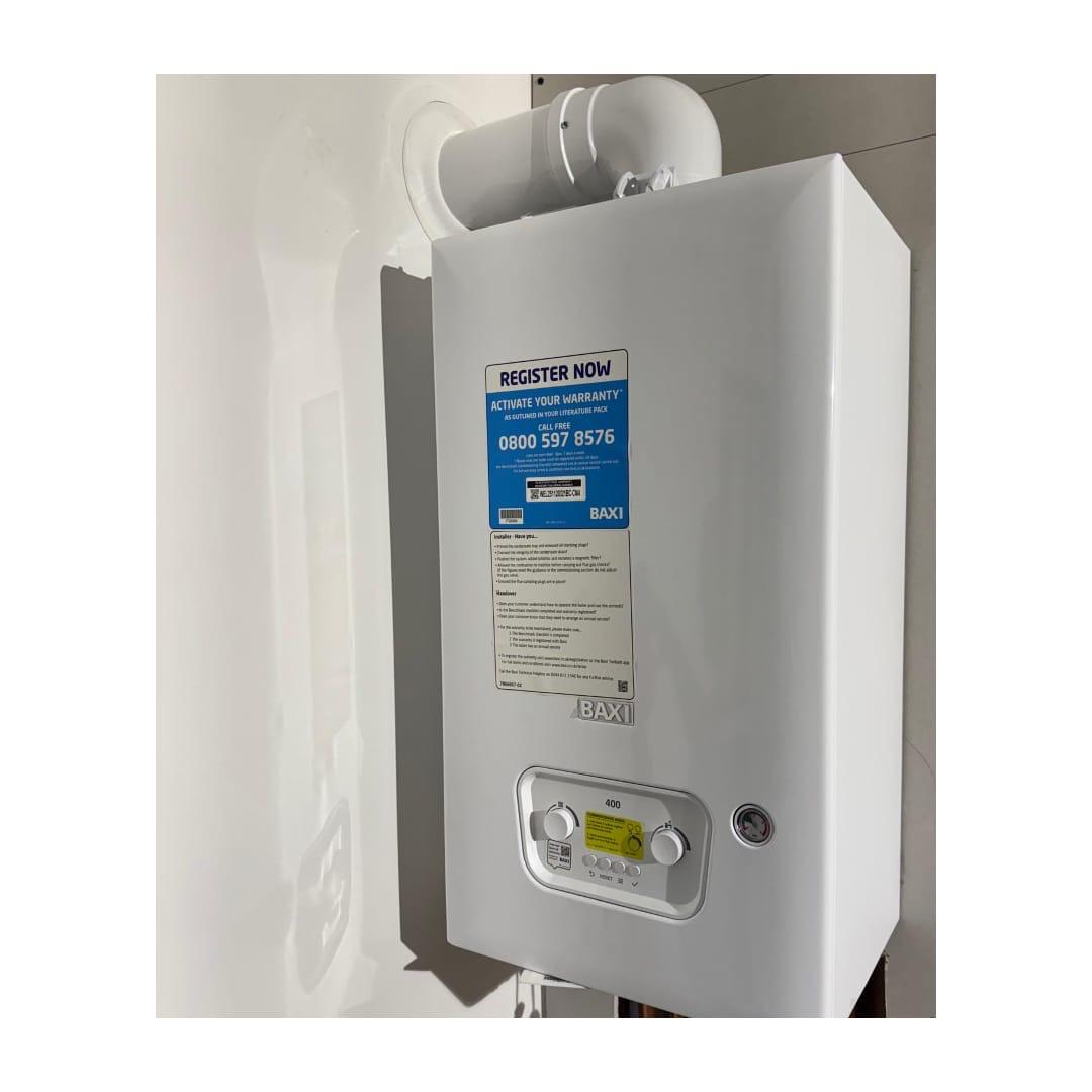 Baxi 400 combi boiler installation with tidy pipework and flue