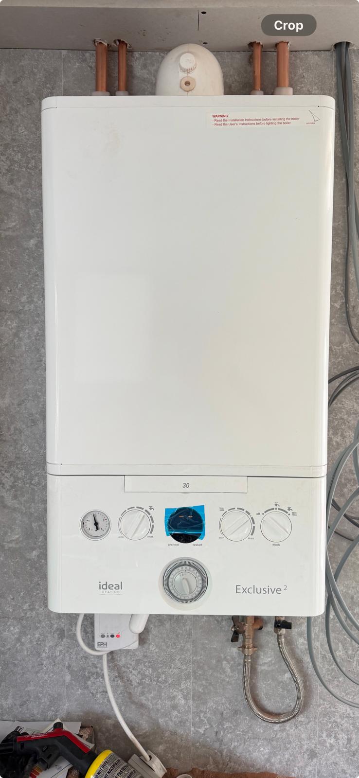 Ideal Exclusive 2 boiler fitted with tidy pipework and system filter
