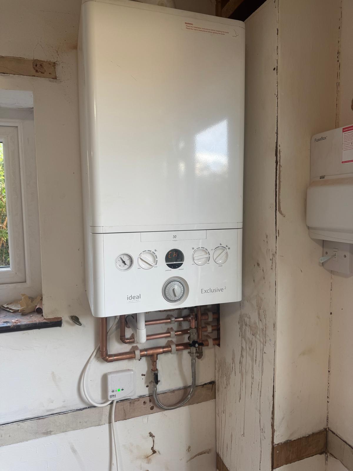 Ideal Exclusive 2 combi boiler installation with copper pipework and filter