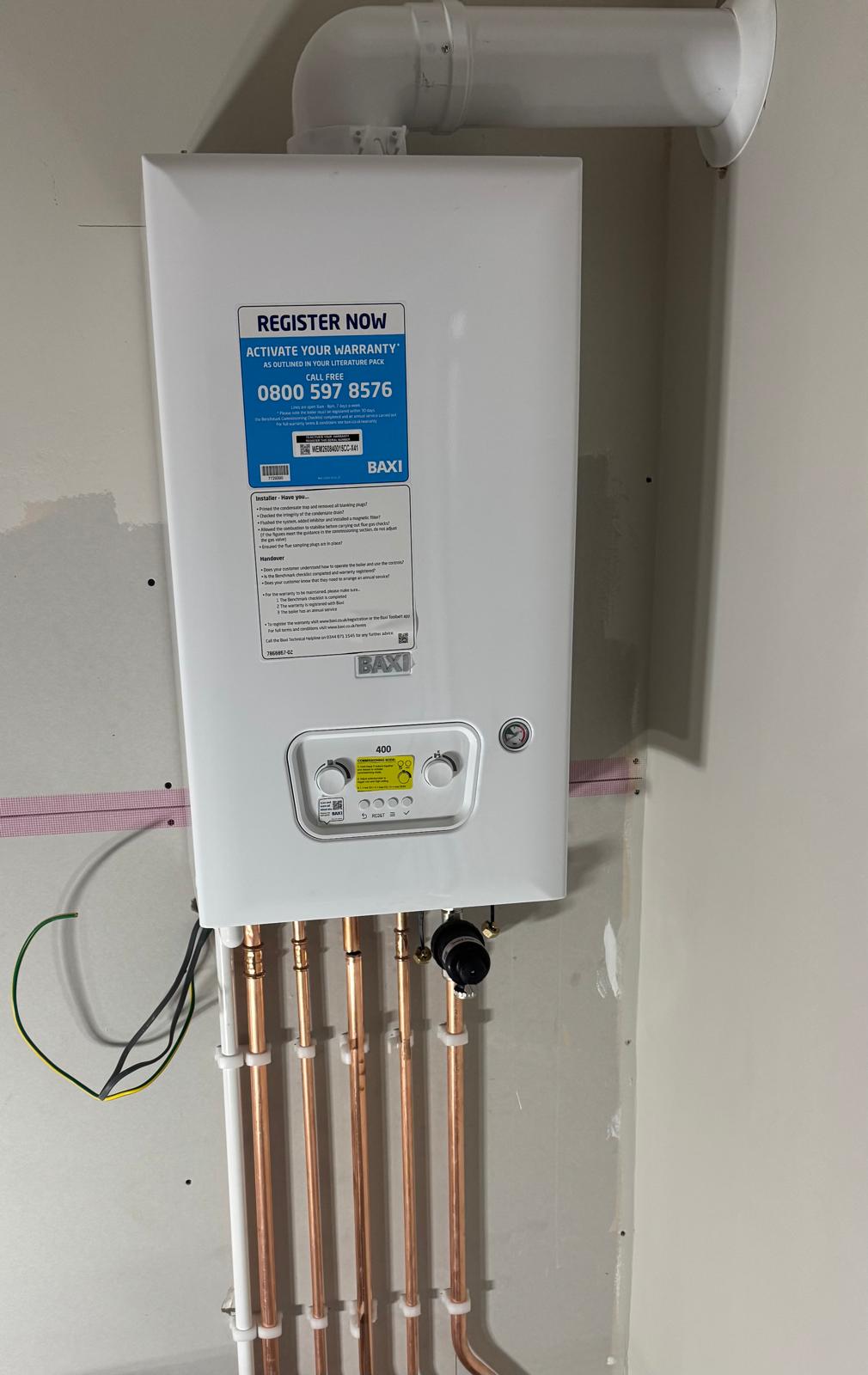 New Baxi 400 combi boiler installation with neat copper pipework, Manchester